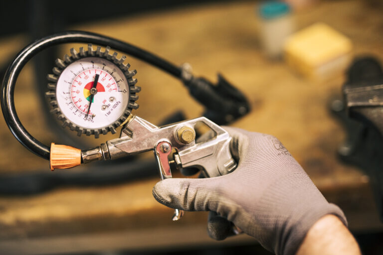 mechanic-repairing-bicycle